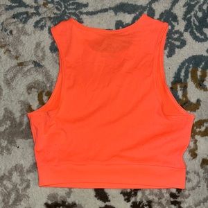 orangy pink nike athletic shirt